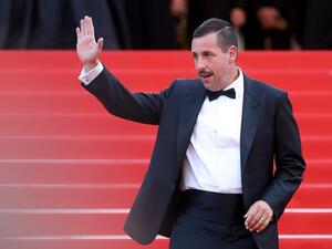 US actor Adam Sandler waves as he arrives on May 21, 2017 for the screening of the film 'The Meyerowitz Stories (New and Selected)'. (AFP/ File)