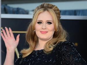 Adele, who broke records with her song "Hello" and latest album "25," was officially the biggest artist of 2015. (AFP)
