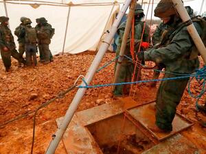 A picture taken last month shows an Israeli soldier outside a tunnel which reportedly connects Lebanon and Israel. (AFP/ File Photo)