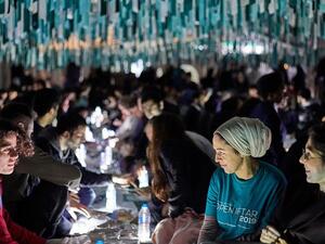 Muslims and non-Muslims gather for an Open Iftar to break their fast during Ramadan. (Ramadan Tent Project)