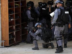 A member of the Israeli security forces aims tear gas at Palestinian protesters at the al-Aqsa Mosque compound, in the Old City of Jerusalem on June 2, 2019, as clashes broke out while Israelis marked Jerusalem Day. (AFP/ File Photo)