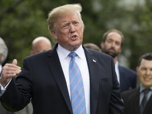 US President Donald Trump gives remarks after receiving a helmet from French race car driver and Indianapolis 500 winner Simon Pagenaud at the White House in Washington, DC, on June 10, 2019. (Jim WATSON / AFP)