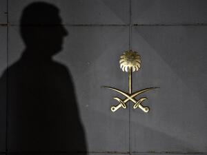 A security member waits in front of the gate door of the Saudi Arabian consulate on October 17, 2018 in Istanbul, few days after Saudi columnist Jamal Khashoggi's murder. (AFP)