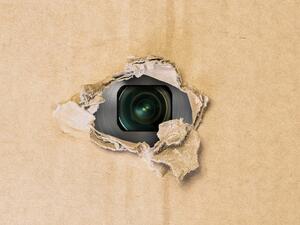 To avoid being caught by hidden wired microphones, you simply need to create some disruptive background noise. 