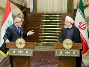 Iranian President Hassan Rouhani, right, and Iraqi Prime Minister Adel Abdul Mahdi speak at news conference in Iranian capital Tehran. ( AFP)