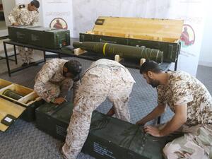Libyan Government of National Accord (GNA) displaying Chinese-made shells bearing the markings of the United Arab Emirates (left side on the box), which were reportedly seized from forces loyal to General Khalifa Haftar in Gharyan. (AFP/ File Photo)