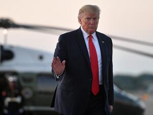 US President Donald Trump makes his way to board Air Force One before departing from Cleveland Hopkins International Airport in Cleveland, Ohio on July 12, 2019. (MANDEL NGAN / AFP)