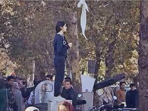 The iconic 'Girl of Enghelab Street,' Vida Movahed, who appeared in public in Tehran, Iran, in December 2017 without wearing a headscarf, as mandated by law. (YouTube screenshot)