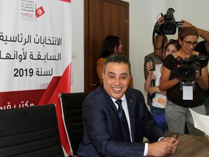 Former Tunisian prime minister Mehdi Jomaa speaks to reporters as he submits his candidacy for the upcoming early presidential elections at the Independent High Authority for Elections (ISIE) in the capital Tunis on August 4, 2019. (AFP/ File Photo)