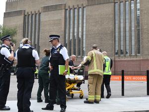 Police, paramedics and fire crews are seen outside the Tate Modern gallery in London on August 4, 2019 after it was put on lock down and evacuated after an incident involving a child falling from height and being airlifted to hospital. (AFP/ File Photo)