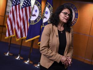 US Representative Rashida Tlaib (D-MI) looks on during an interview after a press conference, to address remarks made by US President Donald Trump earlier in the day, at the US Capitol in Washington, DC.  (AFP/ File Photo)