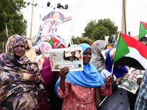 Supporters of Sudan's deposed military ruler Omar al-Bashir gather in protest outside the court house in Khartoum on August 24, 2019. (AFP/ File Photo)