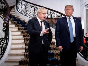 US President Donald Trump (R) and Britain's Prime Minister Boris Johnson speak before a working breakfast at the G7 Summit in Biarritz, France on August 25, 2019. (AFP/ File Photo)