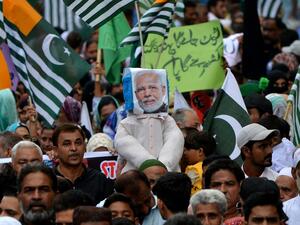 Demonstrators carry an effigy of Indian Prime Minister Narendra Modi during an anti-India protest rally in Karachi on August 25, 2019, in solidarity with India-administered Kashmiri. (AFP/ File Photo)