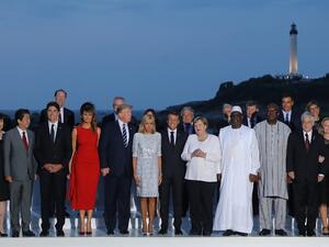 G7 leaders and guests pose for a family picture with the Biarritz lighthouse in the background on the second day of the annual G7 summit in Biarritz, south-west France on August 25, 2019. (AFP/ File Photo)