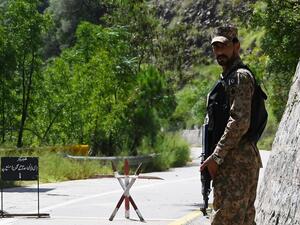 A Pakistani troop patrols near the Line of Control (LoC) --- the de facto border between Pakistan and India. (AFP)