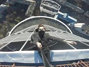 Adventurer shiey uses a camera attached to a selfie stick to show the daring trick off to his fans on social media (https://www.dailymail.co.uk)