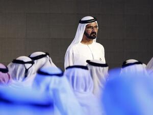 Dubai ruler Sheikh Mohammed bin Rashid al-Maktoum unveils the United Arab Emirates' mission to Mars on May 6, 2015 (AFP Photo/KARIM SAHIB)