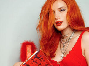 Bella previously discussed being abused in another poem from her book