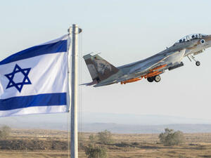 An Israeli Air Force F-15 Eagle fighter plane performs at an air show during the graduation of new cadet pilots at Hatzerim base in the Negev desert. (AFP/ File Photo)
