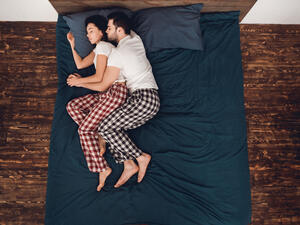 The third most popular position is the Spoon - this is by far the most popular position for couples in new relationships (Shutterstock)	
