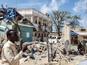 A suicide bomber rammed a vehicle loaded with explosives into the Medina hotel in the port town of Kismayo before several heavily armed gunmen forced their way inside, shooting as they went, authorities said. AFP