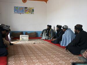 In this picture taken on August 15, 2019, Mohammad Manzoor Hussaini (C back), who previously fought for the Taliban, speaks during an interview with AFP in Kandahar. (AFP/ File Photo)