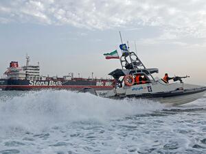 Iranian Revolutionary Guards patrol around the British-flagged tanker Stena Impero as it's anchored off the Iranian port city of Bandar Abbas (AFP)