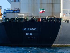 Iranian flag flutters on board the Adrian Darya oil tanker (AFP)