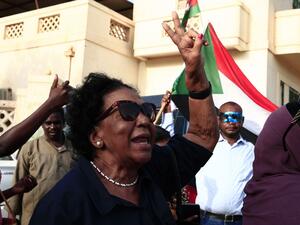 Sudanese woman takes part in a rally against the oppression of women, in Oumdurman the capital Khartoum’s twin city (AFP)