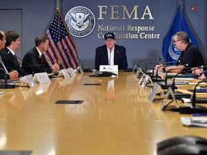 US President Donald Trump receives a briefing at the Federal Emergency Management Administration (FEMA) on Hurricane Dorian in Washington, DC, on September 1, 2019. (AFP/ File Photo)