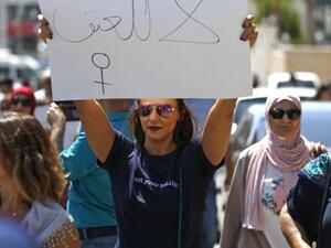 Palestinian women protest in support of women’s rights outside the prime minister’s office in the West Bank city of Ramallah (AFP)