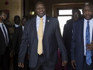 South Sudan's exiled rebel leader Riek Machar (L) arrives for a meeting with his rival, President Salva Kiir (not pictured) in Juba, South Sudan (AFP)