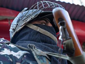 An Indian paramilitary trooper stands guard during heavy restrictions on movements in Srinagar  (AFP)