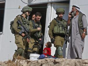 Israeli forces evict Palestinians from mobile homes built by EU funding and undergoing Israeli demolition in the village of Mufagara south of Yatta near Hebron in the occupied West Bank on September 11, 2019. (AFP/ File Photo)