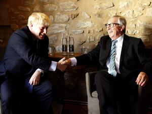 EU Commission president Jean-Claude Juncker (R) shakes hands with British Prime Minister Boris Johnson (L) prior to their meeting, on September 16, 2019 in Luxembourg. (AFP/ File Photo)