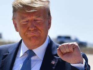 US President Donald Trump gestures after landing at San Diego International Airport in San Diego, California, on September 18, 2019. Trump is in San Diego for a fundraiser and a border visit. (Nicholas Kamm / AFP)