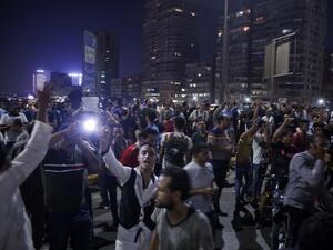 Egyptian protesters shout slogans as they take part in a protest calling for the removal of President Abdel Fattah al-Sisi in Cairo's downtown on September 20, 2019. (AFP)