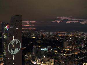 Aerial view of the Batman's symbol projected on the Reforma Tower on the 80th anniversary of US comics fictional superhero in Mexico City, on September 21, 2019. (ALFREDO ESTRELLA / AFP)