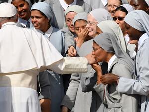 Pope Francis his greeted by nuns during his weekly general audience in the Vatican's Saint Peter square on September 25, 2019. Alberto PIZZOLI / AFP
