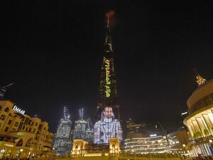A picture taken on September 25, 2019, shows the Gulf emirate's Burj Khalifa, the world's tallest skyscraper, lit with an image of 35-year-old Emirati astronaut Hazzaa al-Mansoori, who is set to spend eight days aboard the International Space Station (ISS). (AFP/ File Photo)