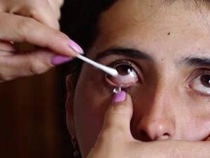 Satenik's relative can be seen drawing one of the crystal tears from her eye using a cotton bud. Svetlana Avagyan said that she thought it was glass when they took the first one out (https://www.dailymail.co.uk/Sputnik)
