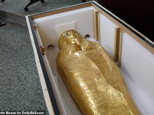 The ancient Egyptian gold coffin of a high-ranking priest that was stolen and sold to New York's Metropolitan Museum of Art. (Daily Mail)