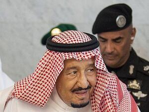 General Abdelaziz al-Fagham (back) recently accompanied King Salman (front) to receive the Iraqi Prime Minister in Jeddah (AFP)