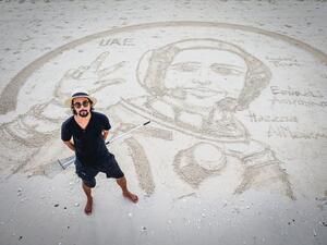 Filipino sand artist creates tribute for Hazzaa AlMansoori. (Twitter)