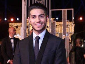 Mena appeared sitting amid the band playing and singing Source menamassoud Instagram