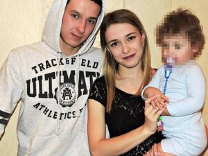 Yulia Sharko (pictured with husband Artur and one of their daughters) was killed in a freak accident when her neck was caught in the closing window of her family's BMW. (Daily Mail)