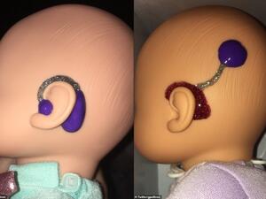 On another doll the pre-school teacher had created her own version of a cochlear implant in red, silver and purple glue. (Twitter)