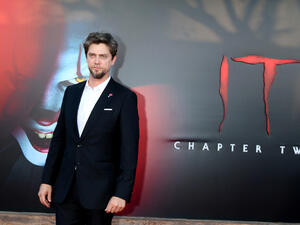 Bill Skarsgard plays Pennywise in the film Source Shutterstock.com Editorial credit Kathy Hutchins