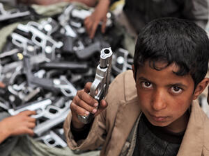 Children playing with toy guns on the street of Sanaa  (Shutterstock)	